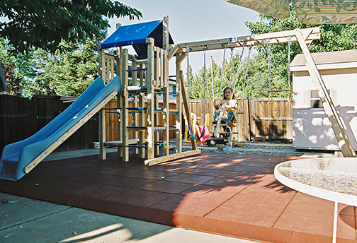 Small Backyard using Kid Kushion Rubber Playground tiles with Swing - Rubber Safety Tile - Playground Safety Surfacing