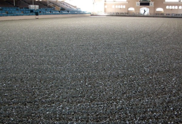 Equine Recycled Rubber Footing in Horse Arena - Rubber Mulch - Equine footing