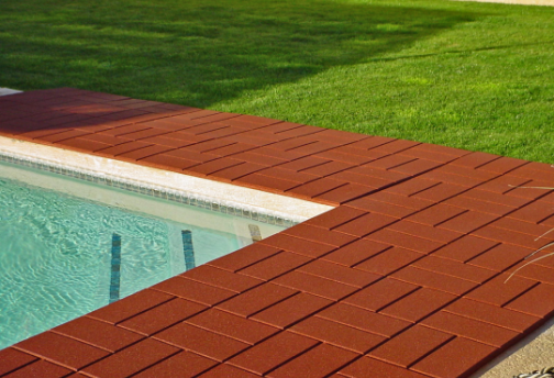 BrickTop Rubber Paver Tile on Pool Deck - Rubber Decking - Pool Deck Covering - Driveway Resurfacing - Rubber Patio Tile