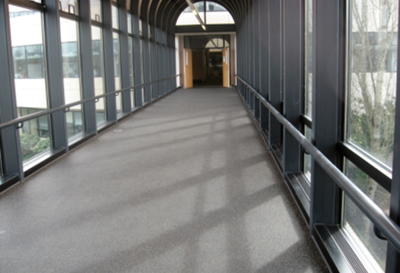Gray-Zip-Tile-Installation - Athletic Flooring - Trade Show Flooring - Interlocking Rolled Rubber Tile - Rubber Flooring