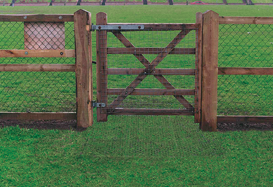 Gate Installation Stage 4 - Rubber Decking - Playground Surfacing - Soil Stabilization