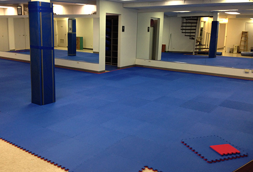 Blue Jumbo EVA Tiles in Gym - Athletic Flooring - Trade Show Flooring - Playground Surfacing