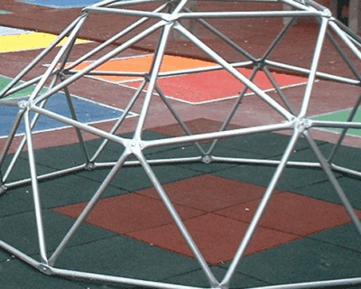 SafeLock Interlocking Playground Tiles with a climbing structure