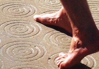 Bare feet on Safety Grooved Concrete